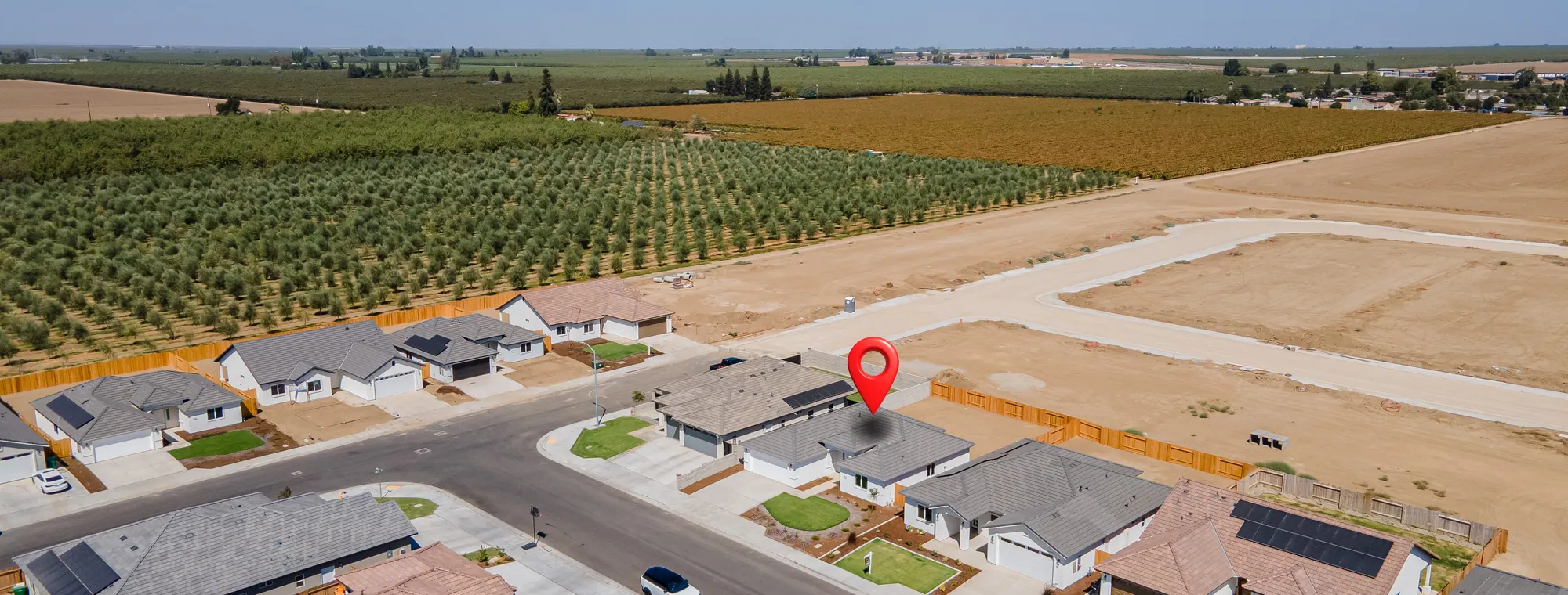 Aerial view of the Shafter tract, with orchards and open farmland beyond